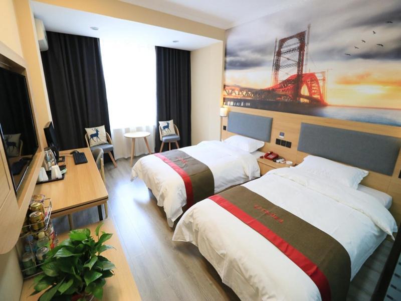 Thank Inn Chain Hotel Gansu Jiuquan Suzhou District Bell And Drum Tower Esterno foto