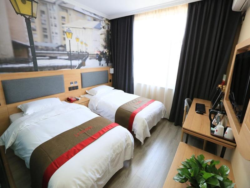 Thank Inn Chain Hotel Gansu Jiuquan Suzhou District Bell And Drum Tower Esterno foto