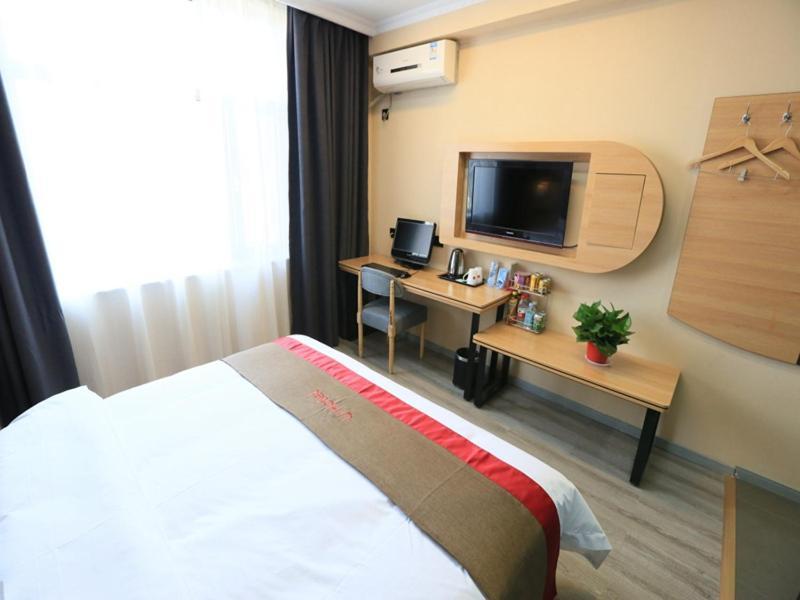 Thank Inn Chain Hotel Gansu Jiuquan Suzhou District Bell And Drum Tower Esterno foto