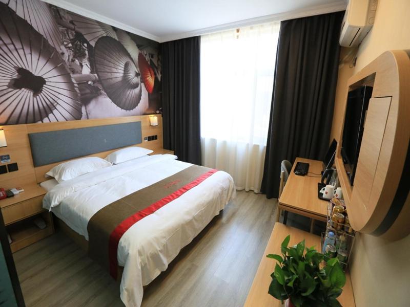 Thank Inn Chain Hotel Gansu Jiuquan Suzhou District Bell And Drum Tower Esterno foto